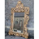 A large and impressive contemporary reproduction wall mirror with rectangular bevelled edge plate