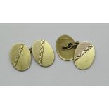 Pair of 9ct engine turned oval cufflinks, 10g total
