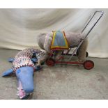 A Merrythought child's toy push along circus elephant, together with a stitched hand crafted soft