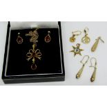 Collection of 9ct jewellery comprising a bow pendant necklace set with red paste and seed pearls,