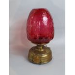 Victorian Veritas brass lamp with large dimpled cranberry shade, 45cm high