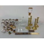 2 pairs of brass ejector candlesticks with brass gun barrel sticks, a collection of candle shade