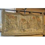 A machine woven Belgian cotton tapestry wall hanging showing a pictorial town scene within an
