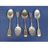 Four Victorian silver fiddle pattern dessert spoons, maker mark worn, London 1848, 17cm long,