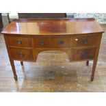 A small 19th century mahogany bow front sideboard in the Georgian manner, five drawers around a