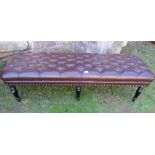 A good quality reproduction stool of rectangular form with brown leather button upholstered seat,