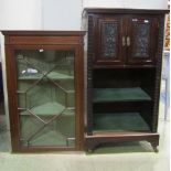 An inlaid Edwardian mahogany freestanding corner cabinet in the Georgian style enclosed by two