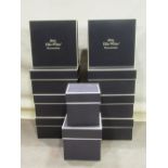 Eight presentation boxes of shallow square form with black colourway and cream trim and lettering,