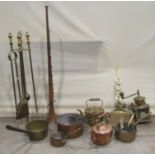 A quantity of miscellaneous copper and brassware to include a graduated set of copper saucepans with