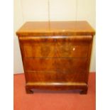 A good quality 19th century chest of four long drawers in mahogany raised on bracket supports,