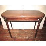 A 19th century mahogany side table with moulded outline and rounded front corners, raised on ring