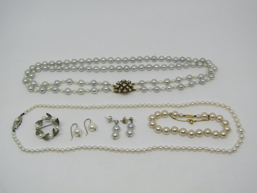 Collection of pearl jewellery comprising a double strand grey pearl necklace with 9ct heart motif