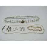 Collection of pearl jewellery comprising a double strand grey pearl necklace with 9ct heart motif