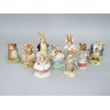 A collection of nine Beswick Beatrix Potter figures comprising Tommy Brock, Mrs Rabbit, Mr
