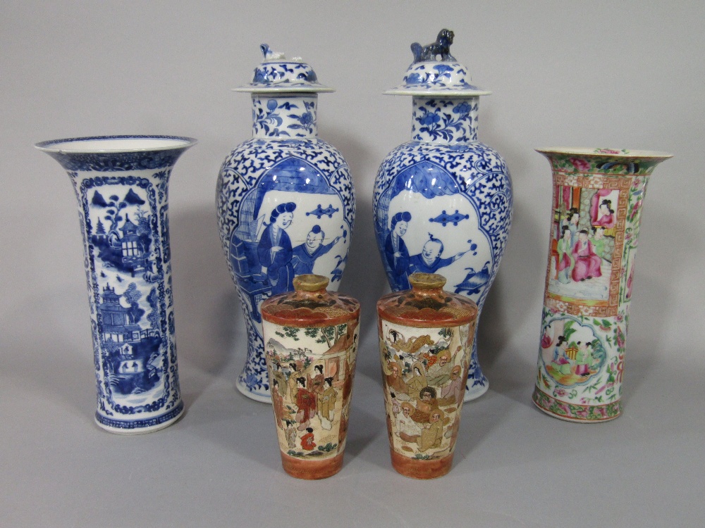 A collection of oriental ceramics comprising a pair of 19th century blue and white vases and