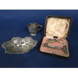 Late Victorian silver trinket dish with geometric pierced sides upon ball feet, maker JMB,