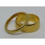 Two 22ct wedding rings; sizes G & H, 5.6g total (2)