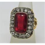Fine quality antique ruby and diamond cluster ring, the collet set ruby measuring 1.6 x 1cm approx