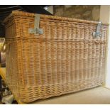 Two similar large wicker laundry baskets, with rope twist carrying handles, metal fittings, timber