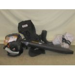 A McCullough petrol leaf blower, model GBV 345, with attachments and a Mitox harness (hardly used/as