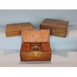 Cross banded mahogany tea caddy, the hinged lid enclosing an interior with two lidded compartments
