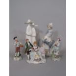 A Lladro Daisa group of a pair of nuns, a Nao group of a girl with a goat, a continental figure