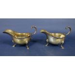 Pair of Georgian style silver sauce/cream boats, maker EJH NH, London 1911, 18cm long, 15.5oz