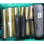 A box containing a collection of clock weights to include a set of three brass cased weights,