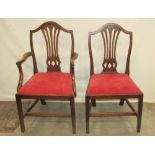 A set of eight (6&2) Hepplewhite style dining chairs, the shield shaped backs with pierced splats