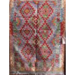 Kelim rug with multi-coloured decoration upon a pale ground, 155 x 105cm