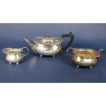 Early 20th century Georgian style boat shaped half fluted tea service comprising teapot, milk jug