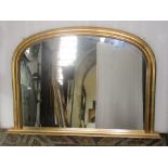 A contemporary Victorian style gilt framed overmantle mirror of moulded arched form together with