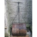 A large Coalbrookdale cast and wrought iron roller with T shaped handle