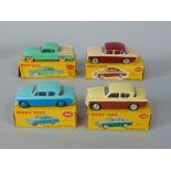 Four Dinky Toys including Humber Hawk 165, Sunbeam Rapier 166, Singer Gazelle 168 and Studebaker