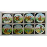 A collection of magic lantern slides, including a set of twelve coloured examples - The Elephants