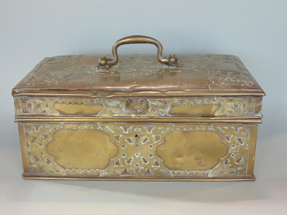 Interesting eastern brass casket/money box with applied brass strap work decoration, 28cm wide