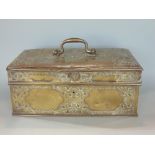Interesting eastern brass casket/money box with applied brass strap work decoration, 28cm wide