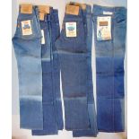 5 pairs of vintage Levi's jeans all unworn, post 1971 and with orange tabs and original labels; 3