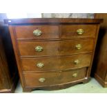 A Victorian mahogany bow fronted chest of three long and two short drawers, with embossed brass