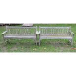Three weathered teak three seat garden benches with slatted seats and backs, approx 160 cm long