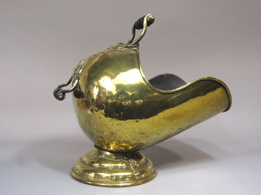 A Victorian brass helmet shaped coal scuttle, with scrolled handles raised on a conical shaped base - Image 2 of 2