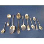 A collection of various silver spoons to include a pair of Georgian Old English table spoons and