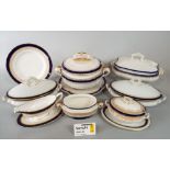 An extensive collection of early 20th century Royal Worcester dinnerwares with blue and gilt