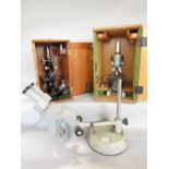 Three microscopes- Opax number 214251, a Prior of London number 12495, both with travel cases and