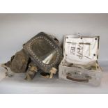 A World War II child's gas mask, aluminium first aid kit and contents