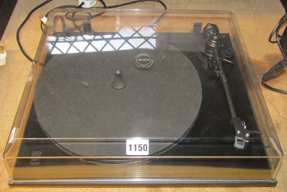 A Revolver record player with hinged lid (no visual model number)