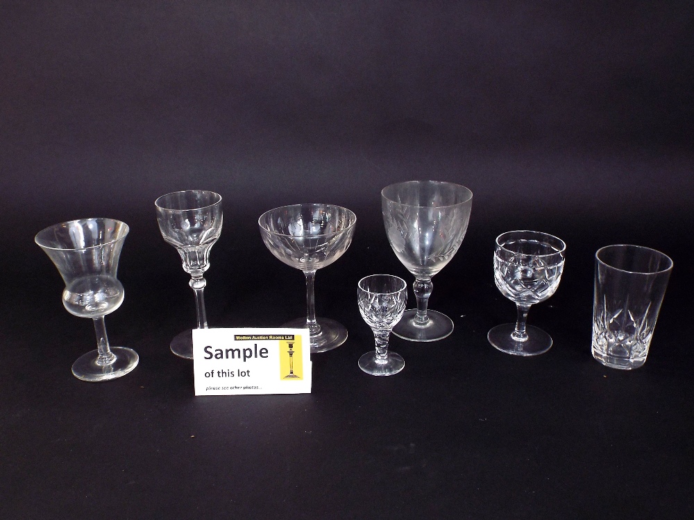 A quantity of drinking glasses of, various sizes, a glass salt, etc