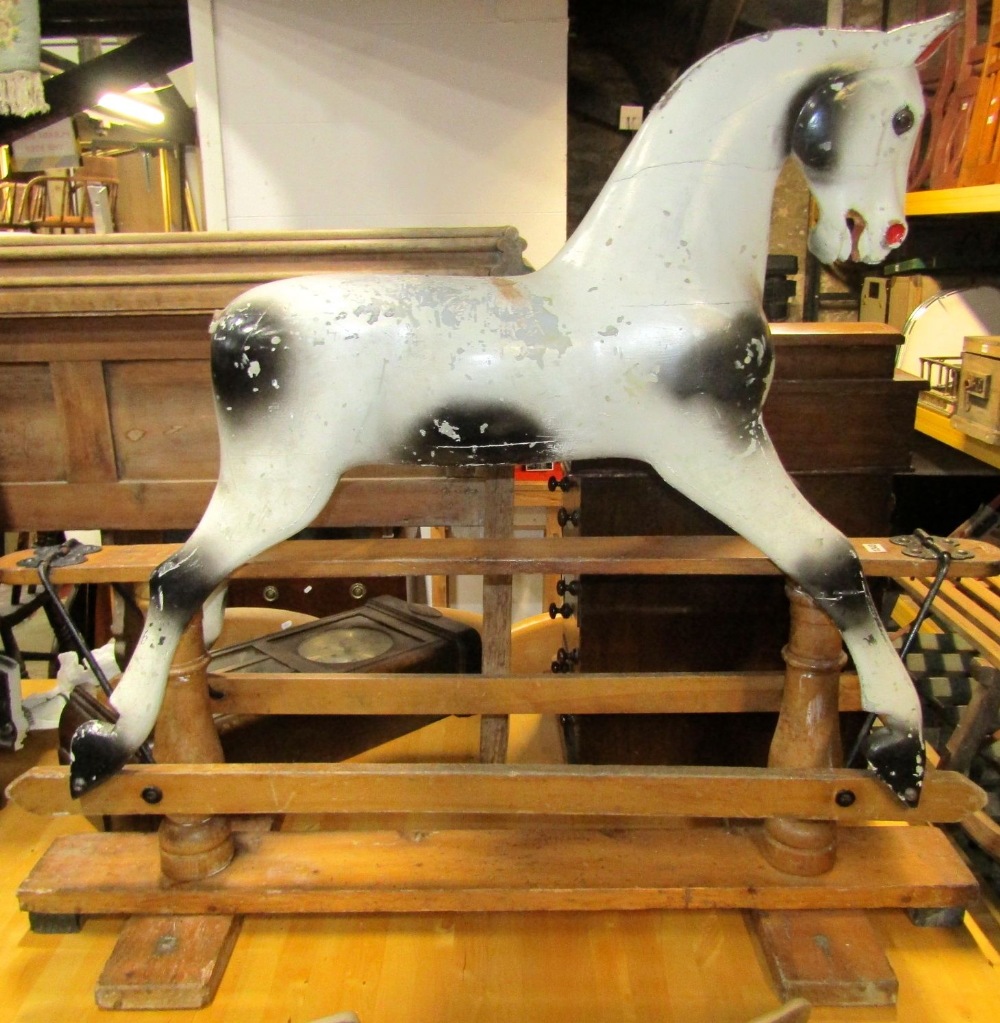 Attributed to F H Ayres, a vintage rocking horse with dapple grey painted finish, raised on a