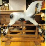 Attributed to F H Ayres, a vintage rocking horse with dapple grey painted finish, raised on a