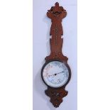 Ecclesiastical oak banjo type barometer, with enamel dial and studded crucifix, 84cm high
